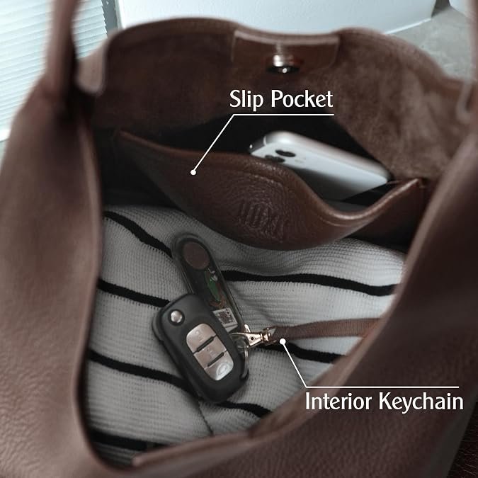 Interior view of hobo bag showing pocket and D-ring for keys