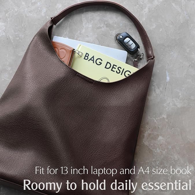 Side view of vegan leather shoulder handbag showing slouchy design
