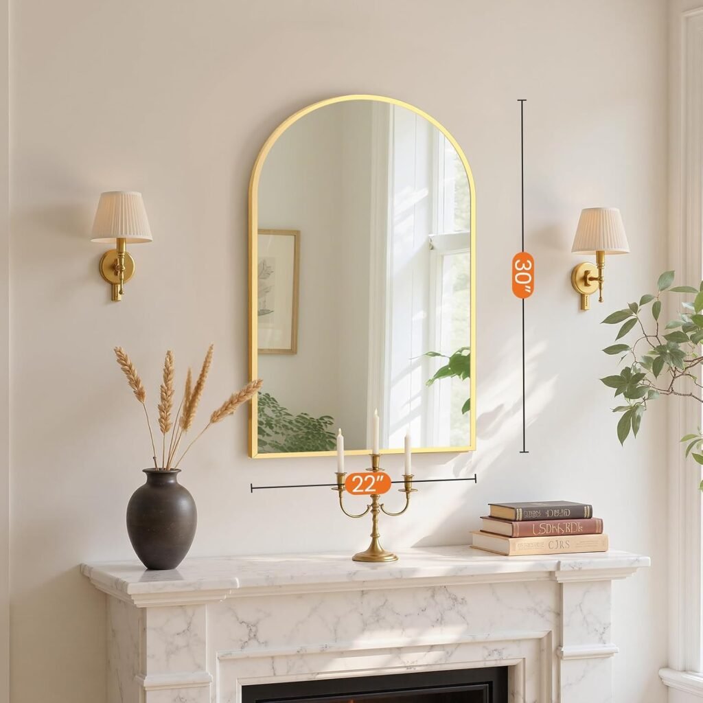 Make your space feel brighter and more open with a decorative wall mirror. Pair it with artificial greenery and textured wall decor to create an attractive entryway, hallway, or living room arrangement.