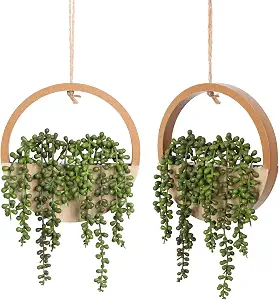 Add natural-looking greenery to your walls or shelves with an artificial hanging plant. The trailing leaves create beautiful movement and are perfect for small spaces where floor space is limited.