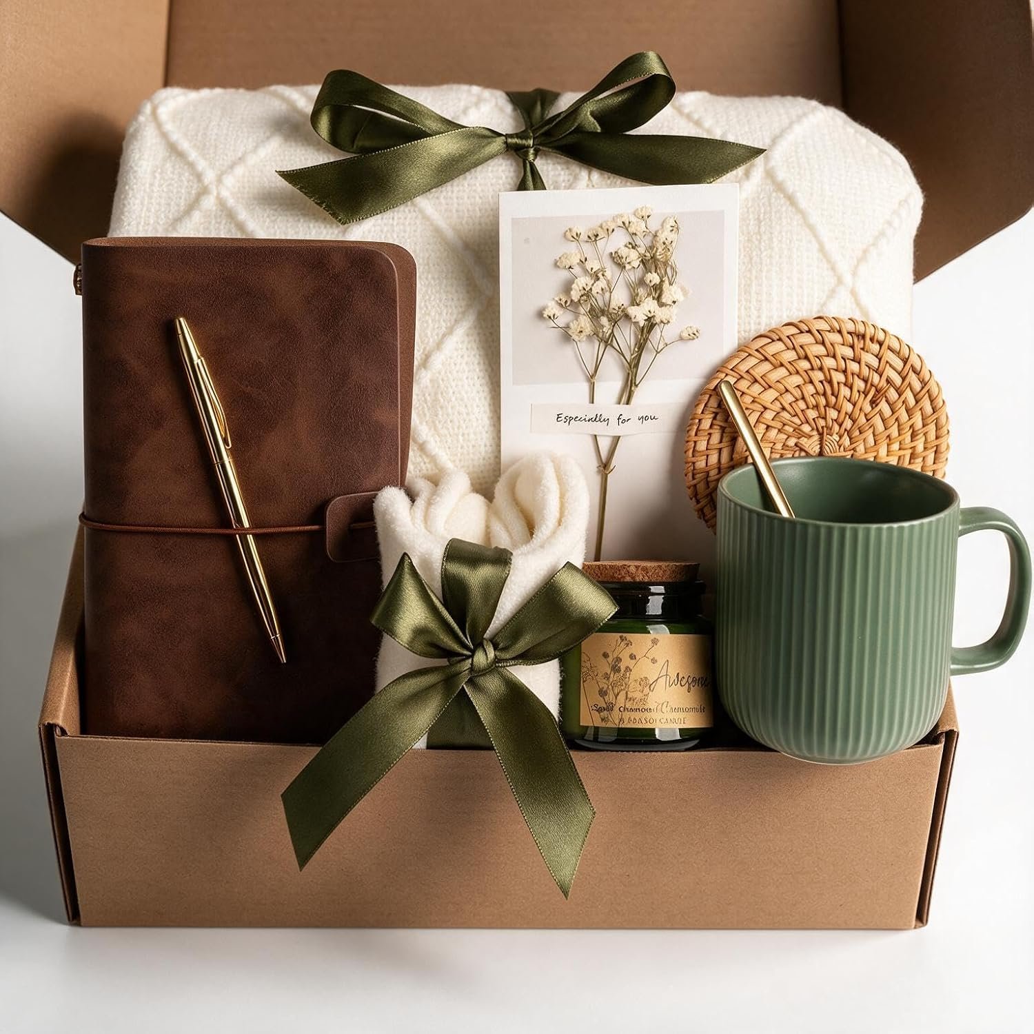 Christmas gift basket for women featuring stylish accessories, a handbag, scarf, jewelry organizer and treats